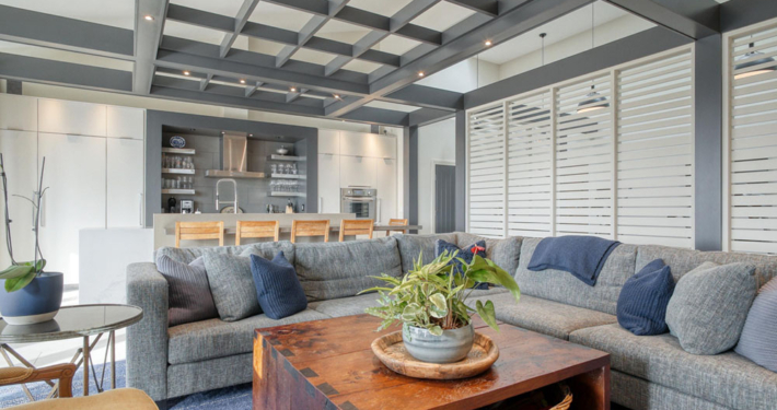 Custom ceiling design in open-concept living space by custom local builder Haggerty Homes.