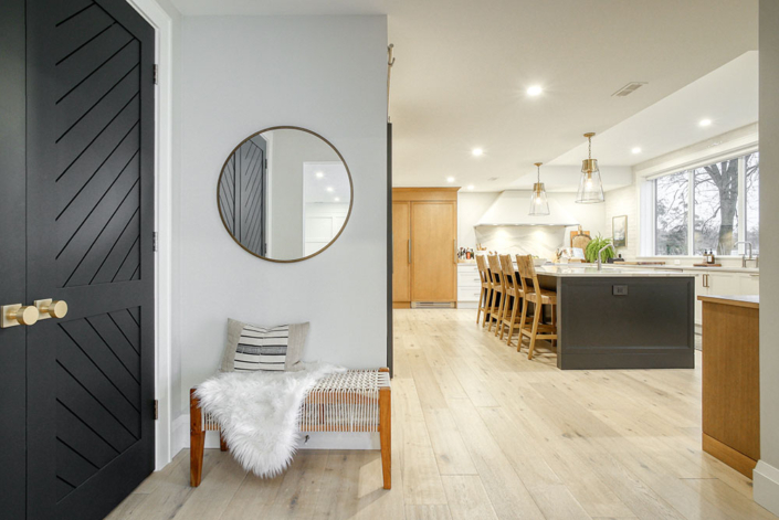 Contemporary entryway with clean lines, minimalist decor, and abundant natural light.